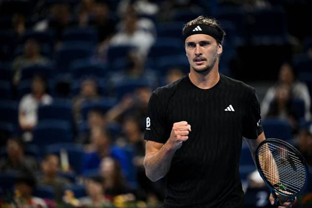 (250928) -- BEIJING, Sept. 28, 2025 -- Alexander Zverev celebrates during the men s singles second round match between Corentin Moutet of France and Alexander Zverev of Germany at 2025 China Open tennis tournament in Beijing, China, Sept. 28, 2025. ) (SP)CHINA-BEIJING-TENNIS-CHINA OPEN-MEN S SINGLES-SECOND ROUND (CN) XinxMengchen 