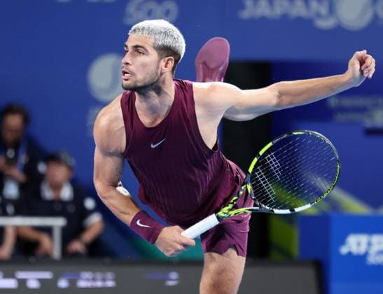 September 28, 2025, Tokyo, Japan - Carlos Alcaraz of Spain delivers a service against Brandon Nakashima of the United States during a quarter-finals of the Japan Open Tennis tournament in Tokyo on Sunday, September 28, 2025. Alcaraz defeated Nakashima 6-2, 6-4. (photo by Yoshio Tsunoda AFLO) Noxthirdxpartyxsales  aflo_305087234