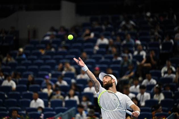 (250928) -- BEIJING, Sept. 28, 2025 -- Corentin Moutet serves during the men s singles second round match between Corentin Moutet of France and Alexander Zverev of Germany at 2025 China Open tennis tournament in Beijing, China, Sept. 28, 2025. ) (SP)CHINA-BEIJING-TENNIS-CHINA OPEN-MEN S SINGLES-SECOND ROUND (CN) XinxMengchen 