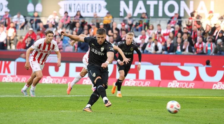 Stuttgart , Bundesliga soccer 1 FC Köln vs VfB Stuttgart, goal scorer Ermedin Demirovic VfB converts a penalty kick to make it 1 1 According to the regulations of the DFL German Football League, it is prohibited to use or have used photographs taken in the stadium and or of the match in the form of sequential images and or video-like photo series