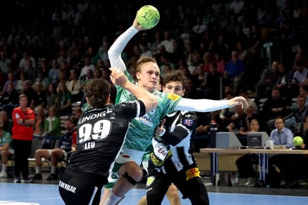 DEU, DHB, 1 HBL, Fuechse Berlin vs ThSV Eisenach, 28 09 2025, Max Schmeling Halle, Berlin, DEU, DHB, 1 HBL, Fuechse Berlin vs ThSV Eisenach, in the picture Lasse Andersson Fuechse Berlin 11 , Tillmann Leu Eisenach 99 , Moritz Ende Eisenach 21 nordphotoxGmbHx xEngler nph00076