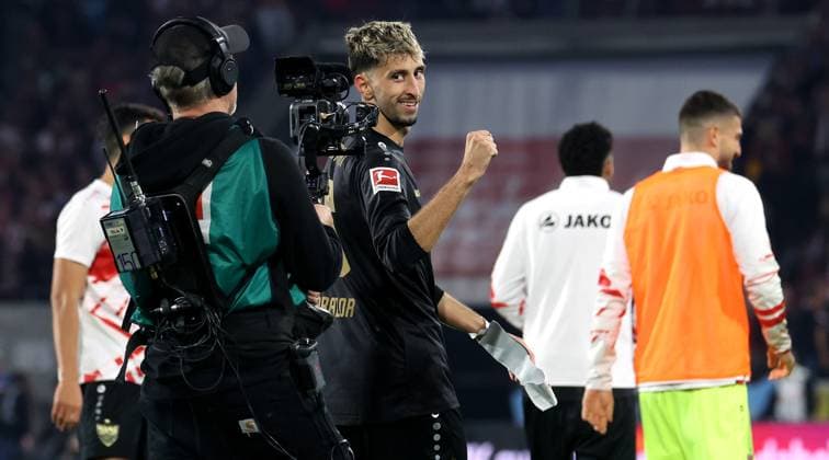 Stuttgart , Bundesliga Football 1 FC Köln vs VfB Stuttgart, Atakan Karazor VfB cheers into the television camera According to the regulations of the DFL German Football League, it is prohibited to use or have used photographs taken in the stadium and or of the match in the form of sequential images and or video-like photo series