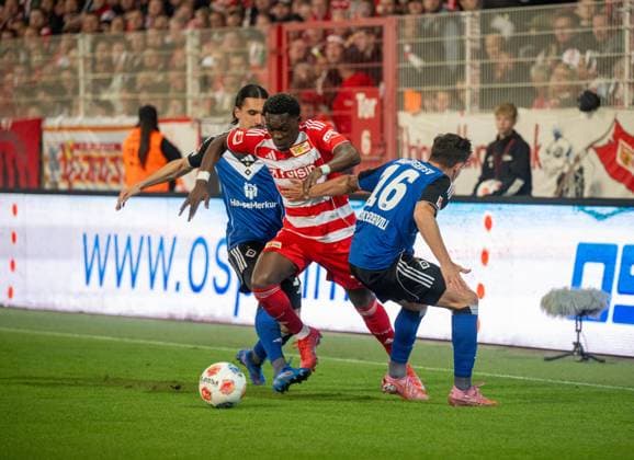 Soccer, Men, Season 2025 2026, 1 Bundesliga 5 Matchday , 1 FC Union Berlin Hamburger SV, v l Rayan Philippe Hamburger SV , Derrick Köhn 1 FC Union Berlin , Giorgi Gocholeishvili Hamburger SV , 28 09 2025, Copyright: xMatthiasxKochx