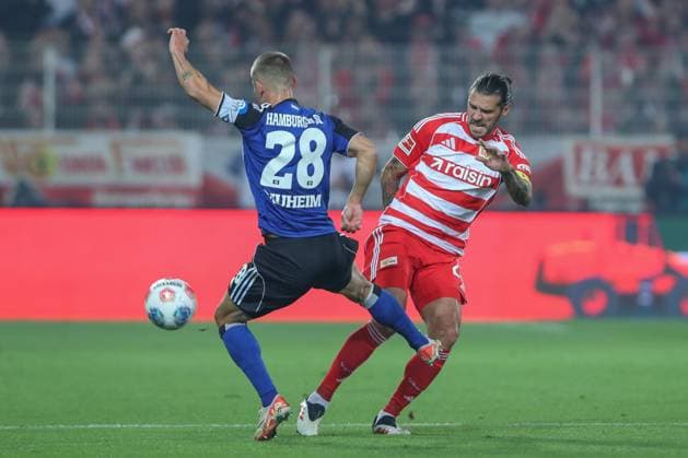 28 09 2025, xtgx, Fußball 1 Bundesliga Union Berlin Hamburger SV v l Miro Muheim HSV, 28 , Christopher Trimmel Union Berlin, 28 Zweikampf, Duell, Kampf, tackle DFL DFB REGULATIONS PROHIBIT ANY USE OF PHOTOGRAPHS as IMAGE SEQUENCES and or QUASI VIDEO Berlin