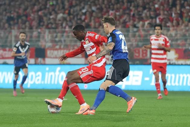 28 09 2025, xtgx, Fußball 1 Bundesliga Union Berlin Hamburger SV v l Ilyas Ansah Union Berlin, 10 , Nicolai Remberg HSV, 21 Zweikampf, Duell, Kampf, tackle DFL DFB REGULATIONS PROHIBIT ANY USE OF PHOTOGRAPHS as IMAGE SEQUENCES and or QUASI VIDEO Berlin