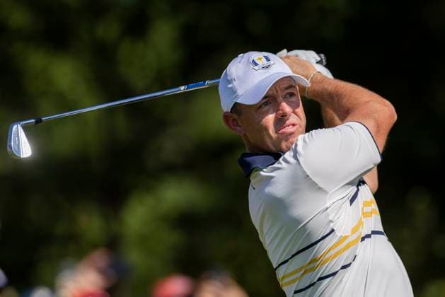 Rory McIlroy of Team Europe drives off the third tee during a singles match against Scottie Scheffler of Team United States on the final day of the 45th Ryder Cup at the Bethpage Black Course in Farmingdale, New York on Sunday, September 28, 2025. Europe has a 12 to 5 lead over the United States going into the final day.  RYD20250928910 COREYxSIPKIN