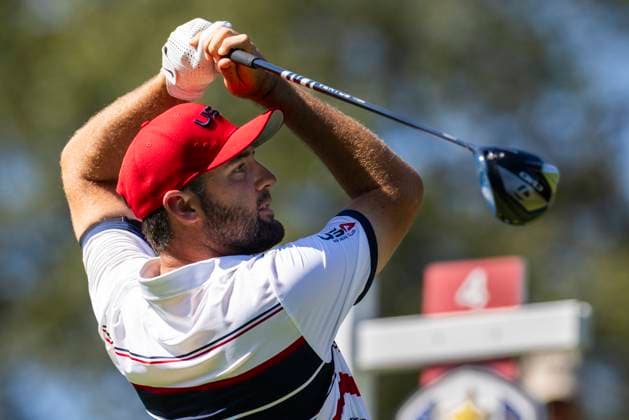Scottie Scheffler of Team United States drives off the fourth tee during a singles match against Rory McIlroy of Team Europe on the final day of the 45th Ryder Cup at the Bethpage Black Course in Farmingdale, New York on Sunday, September 28, 2025. Europe has a 12 to 5 lead over the United States going into the final day.  RYD20250928911 COREYxSIPKIN