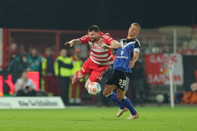 1 Soccer Bundesliga Union Berlin Hamburger SV Oliver Burke Union Berlin 7 in a duel with Muheim Miro HSV 28 , during the match in the 1 Soccer Bundesliga Union Berlin Hamburger SV in Berlin, Stadion An der alten Försterei , on 28 09 2025 DFB regulations prohibit any use of photographs as image sequences and or quasi video Copyright: xBEAUTIFULxSPORTS Frankex