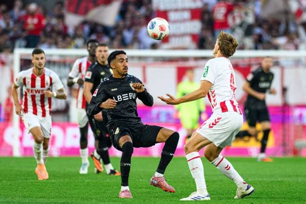 COLOGNE, GERMANY - 28 SEPTEMBER, 2025: Tiago Tomas, Timo Huebers - The football match of Bundesliga 1.FC Koeln vs VfB Stuttgart at Rhein Energie Stadion.  Copyright: xVITALIIxKLIUIEVx