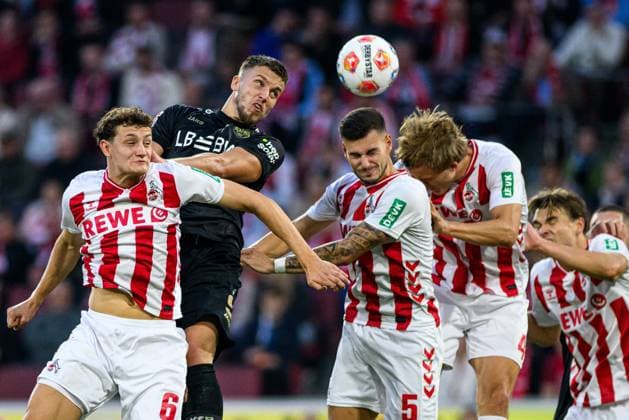 COLOGNE, GERMANY - 28 SEPTEMBER, 2025: Eric Martel, Ermedin Demirovic, Tom Krauss, Timo Huebers - The football match of Bundesliga 1.FC Koeln vs VfB Stuttgart at Rhein Energie Stadion.  Copyright: xVITALIIxKLIUIEVx