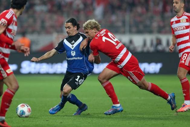 28.09.2025, xtgx, Fussball - 1.Bundesliga Union Berlin - Hamburger SV v.l. Rayan Philippe (HSV, 14), Leopold Querfeld (Union Berlin, 14) Zweikampf, Duell, Kampf, tackle (DFL DFB REGULATIONS PROHIBIT ANY USE OF PHOTOGRAPHS as IMAGE SEQUENCES and or QUASI-VIDEO) Berlin