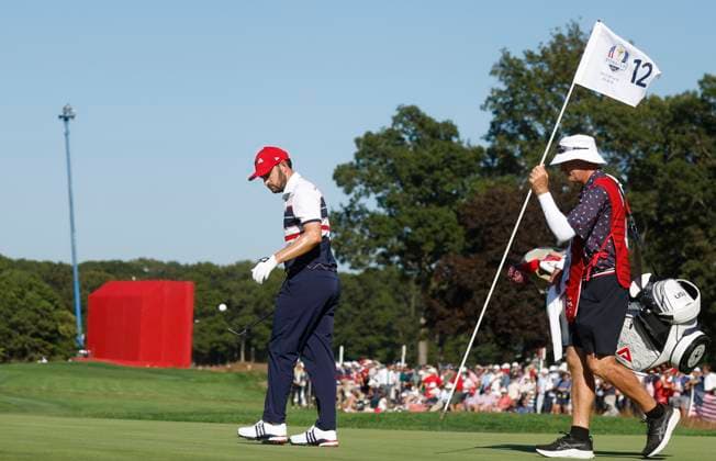 Patrick Cantlay of Team United States reacts after missing a putt on the twelfth green during a singles match against Ludvig Aberg of Team Europe on the final day of the 45th Ryder Cup at the Bethpage Black Course in Farmingdale, New York on Sunday, September 28, 2025. Europe has a 12 to 5 lead over the United States going into the final day.  RYD20250928927 JOHNxANGELILLO