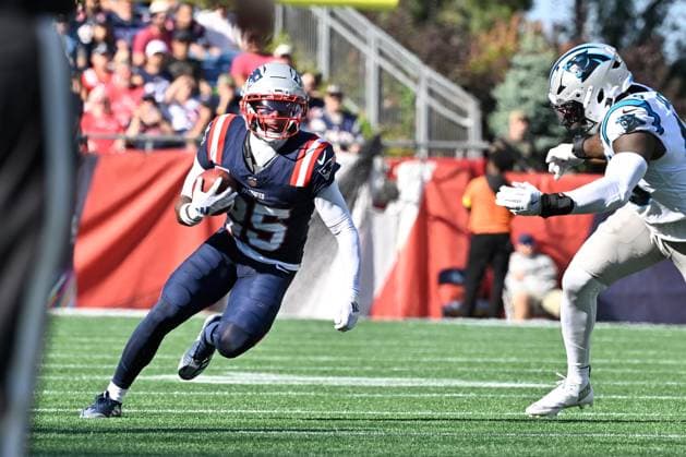 Sep 28, 2025; Foxborough, Massachusetts, USA; New England Patriots cornerback Marcus Jones (25) returns a punt during the second half against the Carolina Panthers at Gillette Stadium, in Foxborough, Massachusetts. CSM Foxborough USA - ZUMAc04_ 20250928_zma_c04_101 Copyright: xEricxCanhax