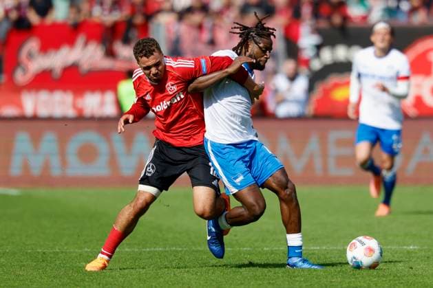 v l duel between Rafael Lubach 1 FC Nuernberg, 18 and Deyovaisio Zeefuik Hertha BSC, 42 28 09 2025, Soccer, 2 Bundesliga, 1 FC Nuernberg Hertha BSC, DEU, Nuremberg, Max Morlock Stadion, DFL REGULATIONS PROHIBIT ANY USE OF PHOTOGRAPHS AS IMAGE SEQUENCES AND OR QUASI VIDEO Copyright: HMBxMedia xHeikoxBecker
