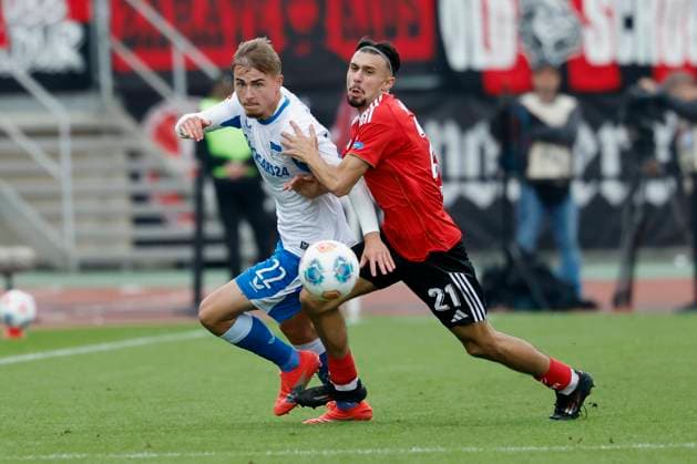 f l Marten Winkler Hertha BSC, 22 and Berkay Yilmaz 1 FC Nuernberg, 21 , 28 09 2025, Football, 2 Bundesliga, 1 FC Nuernberg Hertha BSC, DEU, Nuremberg, Max Morlock Stadion, DFL REGULATIONS PROHIBIT ANY USE OF PHOTOGRAPHS AS IMAGE SEQUENCES AND OR QUASI VIDEO Copyright: HMBxMedia xHeikoxBecker