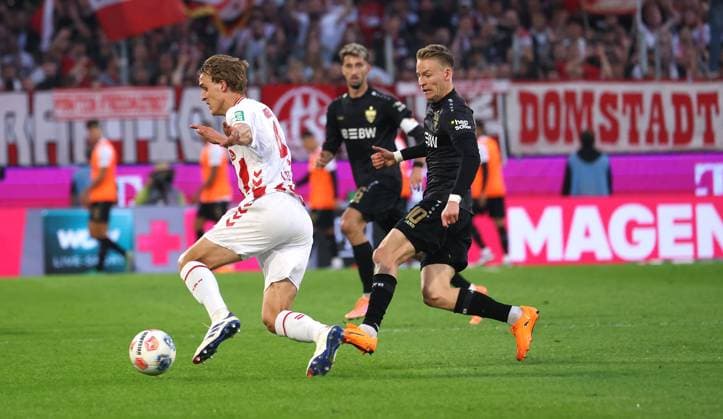 Stuttgart , Bundesliga Soccer 1 FC Köln vs VfB Stuttgart, f l Timo Hübers Köln , Chris Führich VfB According to the regulations of the DFL German Soccer League, it is prohibited to use or have used photographs taken in the stadium and or of the match in the form of sequential images and or video-like photo series