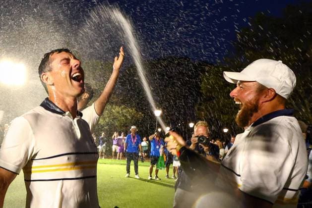 Rory McIlroy and Shane Lowry of Team Europe celebrate with champagne after victory 2025 Ryder Cup, Day Three, Singles, Golf, Bethpage Black Golf Course, New York, USA - 28 Sep 2025New York Bethpage Black Golf Course New York (NY) United States of America EDITORIAL USE ONLY No use with unauthorised audio, video, data, fixture lists, club league logos or live services. Online in-match use limited to 120 images, no video emulation. No use in betting, games or single club league player publications. Copyright: xJamesxMarsh Shutterstockx 15500197mg