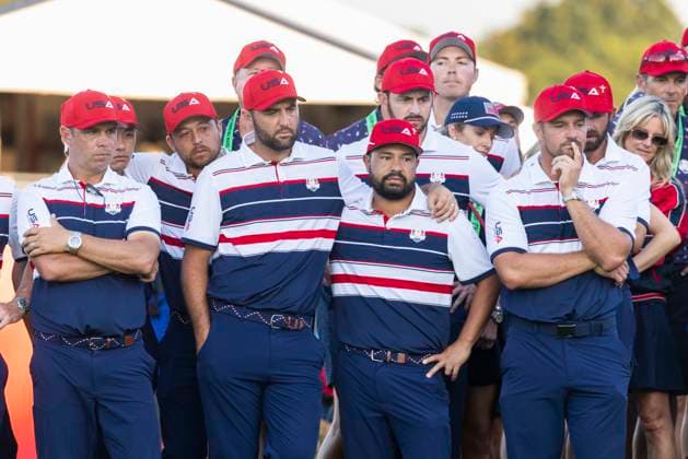 Members of Team United States watch the final putt on the eighteenth green as Team Europe wins the 45th Ryder Cup competition at the Bethpage Black Course in Farmingdale, New York on Sunday, September 28, 2025. The Europeans held off a surging United States team to retain the Cup by a score of 15-13.  RYD20250928521 COREYxSIPKIN