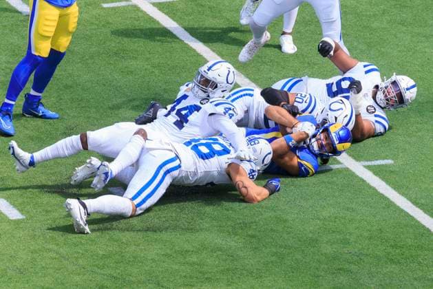 September 28, 2025, Inglewood, California, USA: 12 Puka Nacua, WR of the Los Angeles Rams gets tackled during their regular NFL, American Football Herren, USA season game against the Indianapolis Colts on Sunday September 28, 2025 at SoFi Stadium in Inglewood, California. Rams defeat Colts, 27-20. ARIANA RUIZ PI Inglewood USA - ZUMAp124 20250928_zaa_p124_046 Copyright: xArianaxRuizx