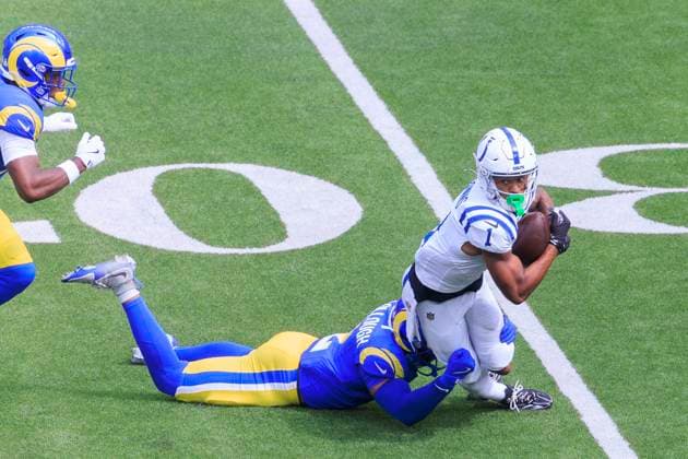 September 28, 2025, Inglewood, California, USA: 2 Jaylen McCollough, SAF of the Los Angeles Rams tackles 1 Josh Downs, WR of the Indianapolis Colts during their regular NFL, American Football Herren, USA season game on Sunday September 28, 2025 at SoFi Stadium in Inglewood, California. Rams defeat Colts, 27-20. ARIANA RUIZ PI Inglewood USA - ZUMAp124 20250928_zaa_p124_079 Copyright: xArianaxRuizx
