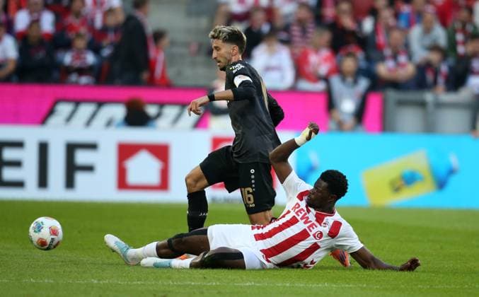 FC Koeln Vs VfB Stuttgar in Koeln, Germany - 28 Sep 2025 Atakan Karazor of VfB Stuttgart and Ragnar Ache of FC Koeln in action during the Bundesliga match between VfB Stuttgart and FC Koeln at RheinEnergie Stadion. ( Final score; VfB Stuttgart 2:1 FC Koeln ) Koeln Germany Copyright: xOsamaxFaisalx xSOPAxImagesx QA017