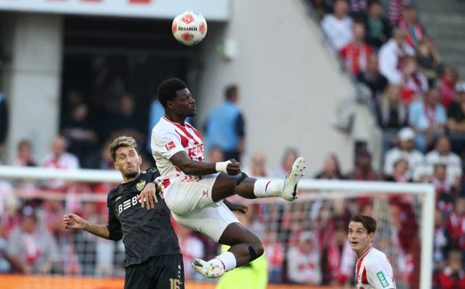 FC Koeln Vs VfB Stuttgar in Koeln, Germany - 28 Sep 2025 Ragnar Ache of FC Koeln and Atakan Karazor of VfB Stuttgart in action during the Bundesliga match between VfB Stuttgart and FC Koeln at RheinEnergie Stadion. ( Final score; VfB Stuttgart 2:1 FC Koeln ) Koeln Germany Copyright: xOsamaxFaisalx xSOPAxImagesx QA018