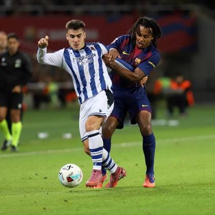 September 28, 2025, Sabadell, Barcelona, Spain: Barcelona Spain 28.09.2025 Jules Kounde FC Barcelona, Barca and Ander Barrenetxea (Real Sociedad) battle for the ball during the La Liga EA Sports between FC Barcelona and Real Sociedad at Estadi Olimpic Lluis Companys on 28 September 2025 in Barcelona. Sabadell Spain - ZUMAu50_ 20250928_zsp_u50_055 Copyright: xXavixUrgelesx
