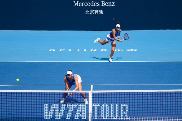 BEIJING, CHINA - SEPTEMBER 29: Tereza Mihalikova of Slovakia and Olivia Nicholls of Great Britain return a shot in the Women s Doubles Round of 16 match against Ulrikke Eikeri of Norway and Giuliana Olmos of Mexico on day 8 of the 2025 China Open at National Tennis Center on September 29, 2025 in Beijing, China.  Copyright: xVCGx 111593910745