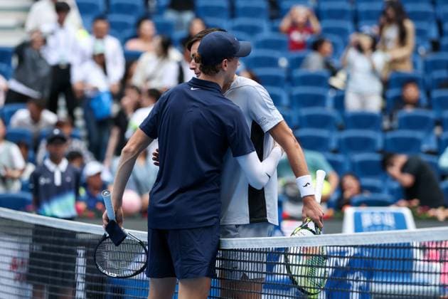 BEIJING, CHINA - SEPTEMBER 29: Jannik Sinner of Italy hugs Fabian Marozsan of Hungary after the Men s Singles Quarterfinal match on day 8 of the 2025 China Open at the National Tennis Center on September 29, 2025 in Beijing, China.  Copyright: xVCGx 111593954086
