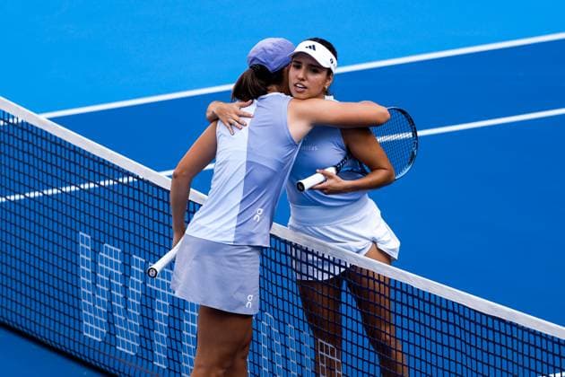 BEIJING, CHINA - SEPTEMBER 29: Iga Swiatek of Poland hugs Camila Osorio of Colombia after the Women s Singles Round of 32 match on day 8 of the 2025 China Open at the National Tennis Center on September 29, 2025 in Beijing, China.  Copyright: xVCGx 111593957414