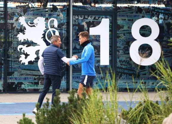 Football, Men, 3 Liga, Season 2025 2026, TSV 1860 Munich, Training, Secret training Gernot Mang, President TSV 1860 Munich left with Florian Niederlechner TSV 1860 Munich right Greeting, high-five before training