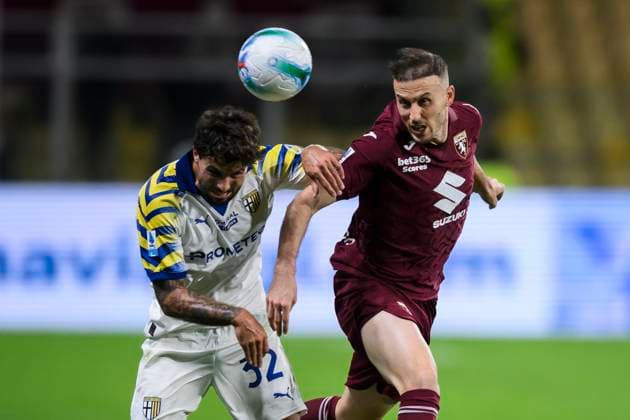 Parma Calcio v Torino FC - Serie A Ardian Ismajli of Torino FC competes for a header with Patrick Cutrone of Parma Calcio during the Serie A football match between Parma Calcio and Torino FC. Parma Italy Copyright: xNicolòxCampox
