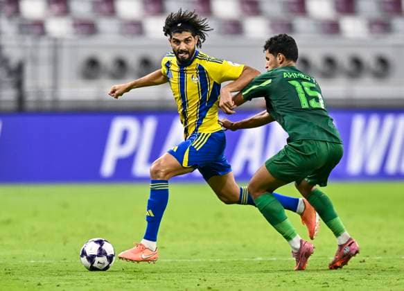 AFC CHAMPIONS LEAGUE ELITE, AL GHARAFA SC (QAT) AL SHORTA (IRQ) Ferjani Sassi (L) of Al Gharafa SC and Ahmed Yahya Al-Hajjaj of Al Shorta in action during the AFC Champions League elite west football match between Qatar s Al Gharafa SC and IraqÕs Al Shorta at Khalifa International Stadium in Doha, Qatar, on November 29, 2025 DOHA Qatar Copyright: xNAUSHADx
