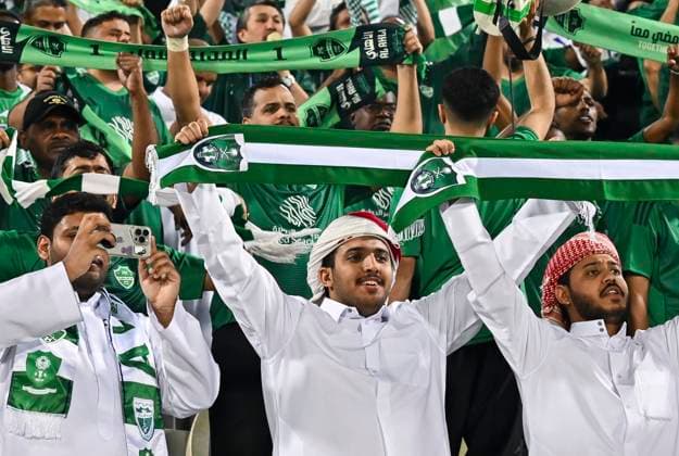 AFC CHAMPIONS LEAGUE ELITE, AL DUHAIL SC (QAT) V AL AHLI SAUDI FC (KSA) Fans of Al Ahli Saudi FC cheer during the AFC Champions League elite west football match between Qatar s Al Duhail SC and Saudi Arabia s Al Ahli Saudi FC at Abdullah Bin Khalifa Stadium in Doha, Qatar, on September 29, 2025. DOHA Qatar Copyright: xNAUSHADx
