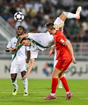AFC CHAMPIONS LEAGUE ELITE, AL DUHAIL SC (QAT) V AL AHLI SAUDI FC (KSA) Krzysztof Piatek (R) of Al Duhail SC and Roger Ibanez Da Silva of Al Ahli Saudi FC in action during the AFC Champions League elite west football match between Qatar s Al Duhail SC and Saudi Arabia s Al Ahli Saudi FC at Abdullah Bin Khalifa Stadium in Doha, Qatar, on September 29, 2025. DOHA Qatar Copyright: xNAUSHADx