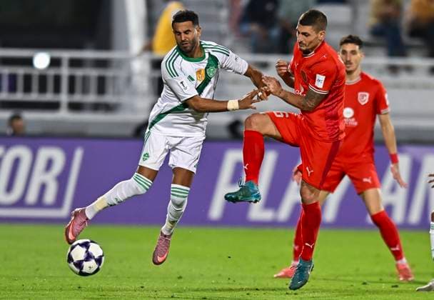 AFC CHAMPIONS LEAGUE ELITE, AL DUHAIL SC (QAT) V AL AHLI SAUDI FC (KSA) Marco Verratti (L) of Al Duhail SC and Riyad Mahrez of Al Ahli Saudi FC in action during the AFC Champions League elite west football match between Qatar s Al Duhail SC and Saudi Arabia s Al Ahli Saudi FC at Abdullah Bin Khalifa Stadium in Doha, Qatar, on September 29, 2025. DOHA Qatar Copyright: xNAUSHADx