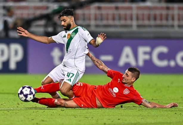 AFC CHAMPIONS LEAGUE ELITE, AL DUHAIL SC (QAT) V AL AHLI SAUDI FC (KSA) Marco Verratti (R) of Al Duhail SC and Saleh Abu Alshamat of Al Ahli Saudi FC in action during the AFC Champions League elite west football match between Qatar s Al Duhail SC and Saudi Arabia s Al Ahli Saudi FC at Abdullah Bin Khalifa Stadium in Doha, Qatar, on September 29, 2025. DOHA Qatar Copyright: xNAUSHADx
