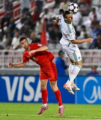 AFC CHAMPIONS LEAGUE ELITE, AL DUHAIL SC (QAT) V AL AHLI SAUDI FC (KSA) Benjamin Bourigeaud (L) of Al Duhail SC and Roger Ibanez Da Silva of Al Ahli Saudi FC in action during the AFC Champions League elite west football match between Qatar s Al Duhail SC and Saudi Arabia s Al Ahli Saudi FC at Abdullah Bin Khalifa Stadium in Doha, Qatar, on September 29, 2025. DOHA Qatar Copyright: xNAUSHADx