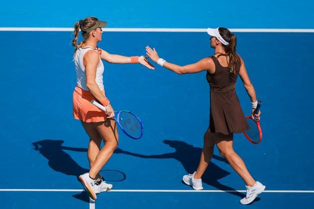 BEIJING, CHINA - SEPTEMBER 30: Timea Babos of Hungary and Luisa Stefani of Brazil react in the Women s Doubles Round of 16 match against Xu Yifan and Yang Zhaoxuan of China on day 9 of the 2025 China Open at the National Tennis Center on September 30, 2025 in Beijing, China.  Copyright: xVCGx 111594164938