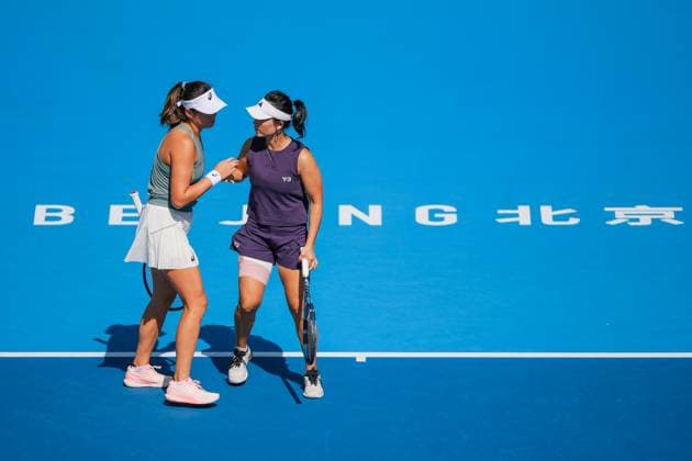 BEIJING, CHINA - SEPTEMBER 30: Xu Yifan and Yang Zhaoxuan of China react in the Women s Doubles Round of 16 match against Timea Babos of Hungary and Luisa Stefani of Brazil on day 9 of the 2025 China Open at the National Tennis Center on September 30, 2025 in Beijing, China.  Copyright: xVCGx 111594165022
