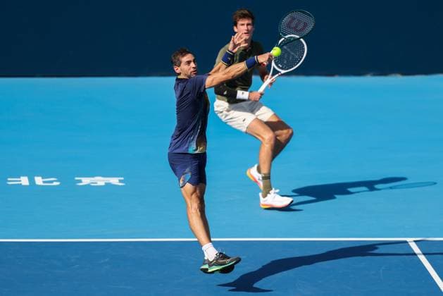 BEIJING, CHINA - SEPTEMBER 30: Guido Andreozzi of Argentina and Manuel Guinard of Fance compete in the Men s Doubles Semifinal match against Henry Patten of Great Britain and Harri Heliovaara of Finland on day 9 of the 2025 China Open at the National Tennis Center on September 30, 2025 in Beijing, China.  Copyright: xVCGx 111594180207