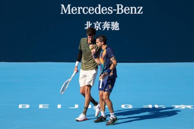BEIJING, CHINA - SEPTEMBER 30: Guido Andreozzi of Argentina and Manuel Guinard of Fance compete in the Men s Doubles Semifinal match against Henry Patten of Great Britain and Harri Heliovaara of Finland on day 9 of the 2025 China Open at the National Tennis Center on September 30, 2025 in Beijing, China.  Copyright: xVCGx 111594180152