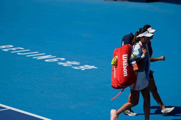 (250930) -- BEIJING, Sept. 30, 2025 -- Xu Yifan(R) Yang Zhaoxuan leave the court after the women s doubles second round match between Xu Yifan Yang Zhaoxuan of China and Timea Babos of Hungary Luisa Stefani of Brazil at 2025 China Open tennis tournament in Beijing, China, Sept. 30, 2025. ) (SP)CHINA-BEIJING-TENNIS-CHINA OPEN-WOMEN S DOUBLES-SECOND ROUND(CN) XiexHan 