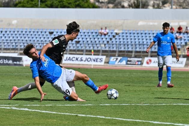 Uefa Youth League Paphos FC U19 FC Bayern München U19 30 09 2025 in duel Panagiotis TSVIVKOS Paphos FC U19 19 and Adin LICINA FCB 7 duel UEFA Youth League Paphos FC U19 FC Bayern München U19 Stelios Kyriakides Stadium on 30 09 2025 Copyright: xBEAUTIFULxSPORTS Goldbergx