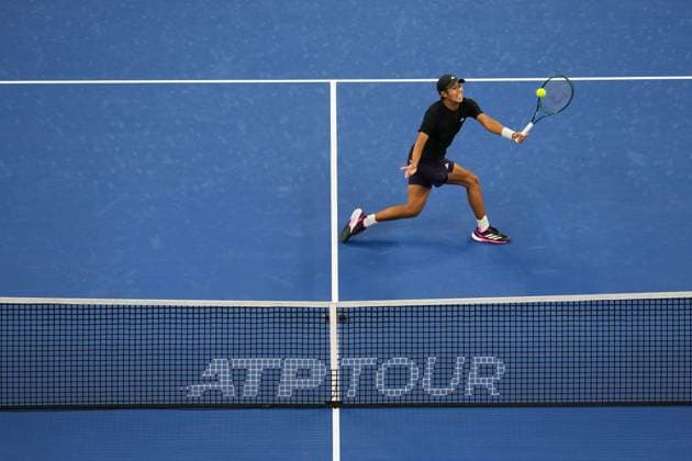 (250930) -- BEIJING, Sept. 30, 2025 -- Learner Tien hits a return during the men s singles semifinal match between Daniil Medvedev of Russia and Learner Tien of the United States at 2025 China Open tennis tournament in Beijing, China, Sept. 30, 2025. ) (SP)CHINA-BEIJING-TENNIS-CHINA OPEN-MEN S SINGLES-SEMIFINALS (CN) NaxYuqi 