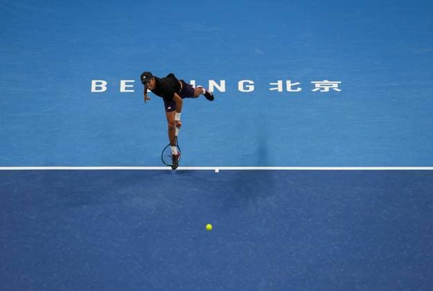 (250930) -- BEIJING, Sept. 30, 2025 -- Learner Tien serves during the men s singles semifinal match between Daniil Medvedev of Russia and Learner Tien of the United States at 2025 China Open tennis tournament in Beijing, China, Sept. 30, 2025. ) (SP)CHINA-BEIJING-TENNIS-CHINA OPEN-MEN S SINGLES-SEMIFINALS (CN) NaxYuqi 