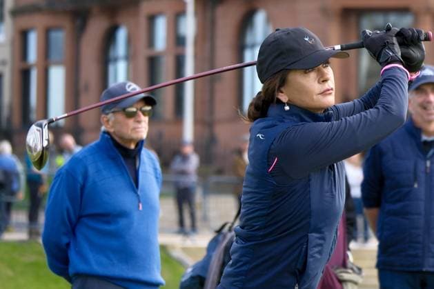 UK: The Alfred Dunhill Links Championship at The Old Course, St Andrews, Scotland on 30 September 2025: Pictured: Actress Catherine Zeta-Jones is watched by her husband Actor Michael Douglas on the 1st tee during a practice round at the Alfred Dunhill Links Championship 2025 at the Old Course, St Andrews St Andrews The Old Course Scotland Copyright: xAlexxToddx