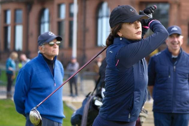 UK: The Alfred Dunhill Links Championship at The Old Course, St Andrews, Scotland on 30 September 2025: Pictured: Actress Catherine Zeta-Jones is watched by her husband Actor Michael Douglas on the 1st tee during a practice round at the Alfred Dunhill Links Championship 2025 at the Old Course, St Andrews St Andrews The Old Course Scotland Copyright: xAlexxToddx