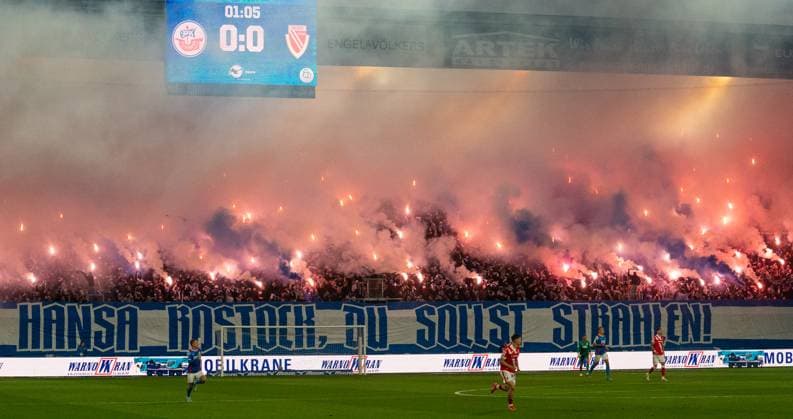 30 9 2025, Football, GER, Men, 3 League, DFL, Matchday 9, Season 2025 26, FC Hansa Rostock FC Energie Cottbus, The fans of FC Hansa Rostock set off pyro flares and Bengalos in their block shortly after kick-off Rostock Ostseestadion Mecklenburg Vorpommern Germany