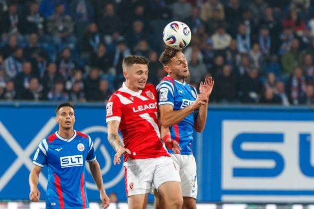 left Erik Engelhardt FCE vs Marco Schuster Rostock GER, FC Hansa Rostock vs FC Energie Cottbus, Soccer, Men, 3 Liga, 09 Matchday, Season 2025 2026, 30 09 2025 Rostock Ostseestadion Mecklenburg Vorpommern Germany